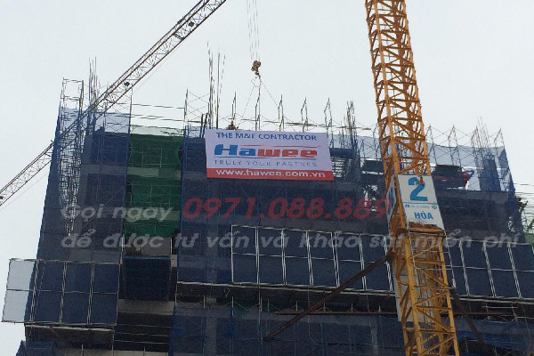 Biển quảng cáo in bạt gắn tòa nhà tại Hà Đông